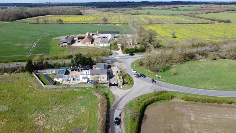 Lower Field Farm (upper in frame) and Bourton Canal Old Wharf, at the junction with the main A420 highway. Photo by Neil B. Maw